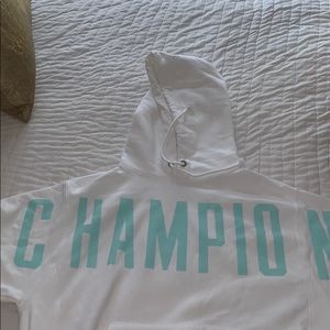 White champion hoodie with blue details
